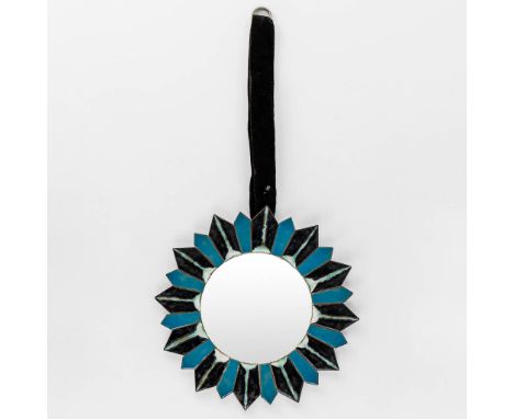 A mid-century Sunburst mirror, blue and black enamel on copper, glass.Dimensions: (D:31,5 cm)