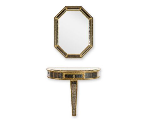 Deknudt, a console table and mirror, brass and glass.Dimensions for the mirror: 60 x 80 cmDimensions console table:&nbsp;70 x