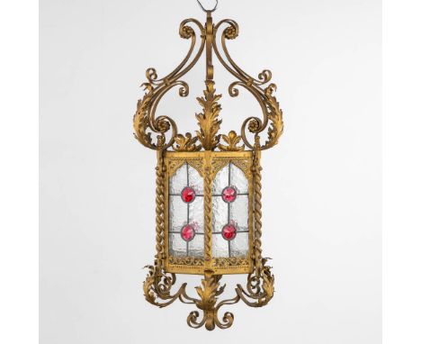 A decorative Lantern, gilt metal and stained glass.&nbsp;Dimensions: (H:96 x D:48 cm)