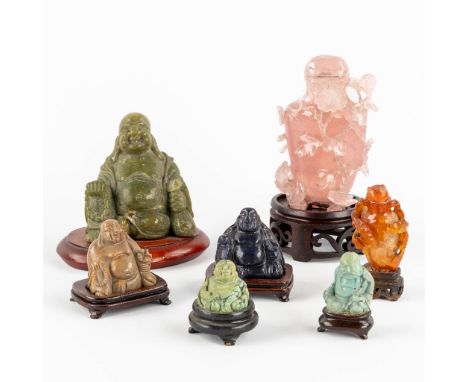 Six Buddha and a snuff bottle, Sculptured hardstones or jade. China.&nbsp;Dimensions: (L:6 x W:8 x H:11,5 cm)