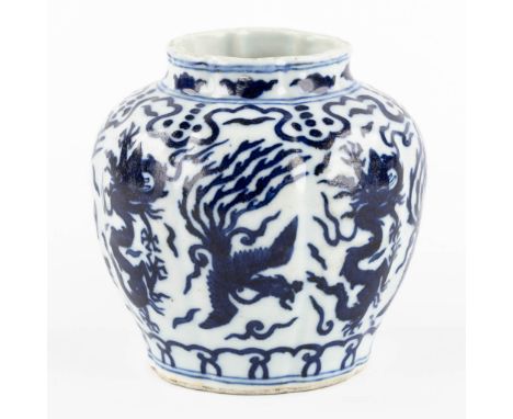 A Chinese eight-lobed vase decorated with phoenixes and dragons.&nbsp;Marked 'Made During The Wanli Reight of the Ming Dynast