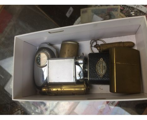 A box of vintage lighters 