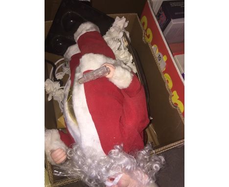 A box of misc to include clock, table lamp, Santa, etx 