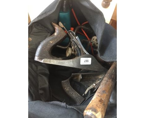 A bag of tools including two planes. 