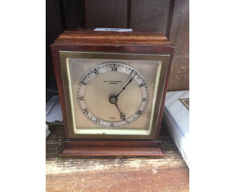 An Elliott clock with Boodle &amp; Dunthorne dial. 