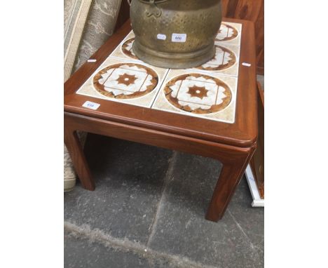 A G-Plan tile top teak table. 