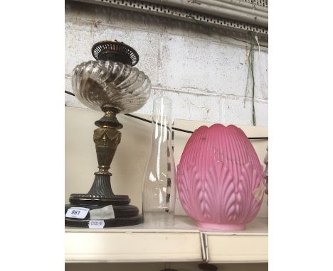 Brass and glass oil lamp with funnel and broken pink shade 