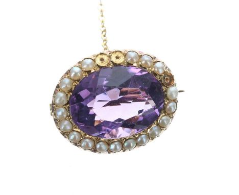 15ct amethyst and seed pearl oval brooch with safety chain, 3.5gm, 16mm x 19mm (one pearl missing) 