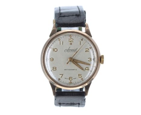 Accurist 9ct gentleman's wristwatch, silvered dial with Arabic numerals and centre seconds, black strap, 32mmMovement - curre