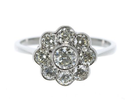 Platinum diamond daisy cluster ring, round brilliant-cut estimated 1.00ct approx, clarity VS2/SI, colour I-K, 11.5mm diameter