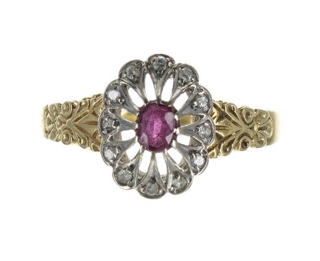18ct ruby and diamond oval cluster ring, the ruby 0.12ct approx in a diamond surround, 12mm x 9mm, 3.2gm, ring size Q - ** wi