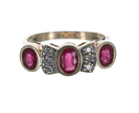 Ruby and diamond 9ct ring, set with three oval rubies, estimated 1.20ct in total, width 8mm, 4.8gm, ring size Q 