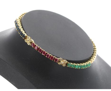 Attractive 14k Emerald, diamond, ruby and sapphire yellow gold bracelet, width 4.5mm, 9.4gm, 7.25" long 