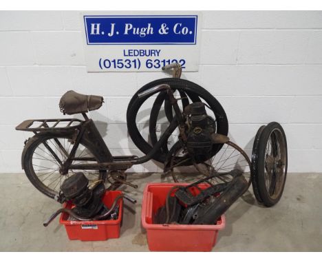 Velosolex autocycle project with  boxes of assorted spares to include wheel rims, tyres, engine parts, etc. 