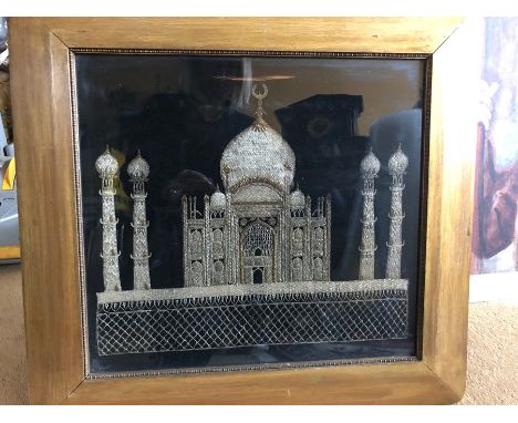 Needlework depiction of the Taj Mahal in silver and gold thread work. 