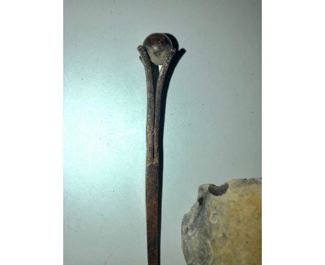 A hairpin, possibly Roman and flint axe head. 