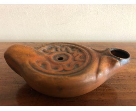 Roman pottery oil lamp, 11cms length approx, good condition. 