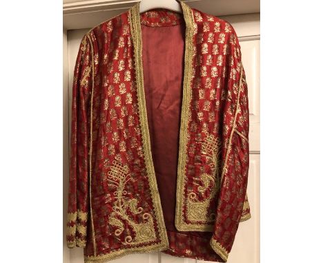 Oriental red jacket embroidered in gold thread work in good condition. 