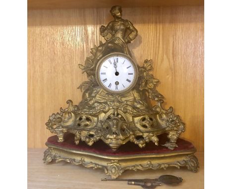 Gilt metal mantel clock on stand, slightly a/f.