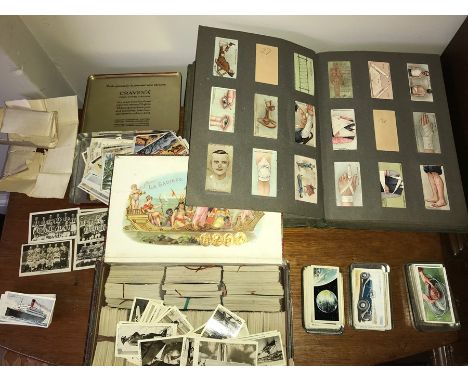 A large quanity of cigarette cards, some loose to include Allied Army Leaders, Military Motors, Famous inventions etc.