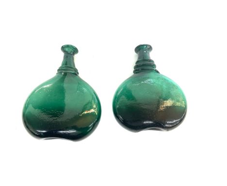 Pair of antique 18th century persian emerald green blown glass camel saddle flask