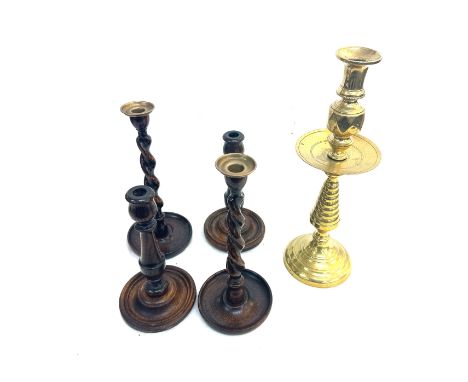 2 pairs of vintage wooden candle sticks and a brass candle stick