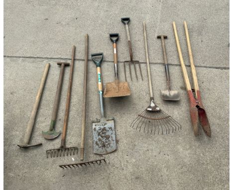 Selection of gardening tools to include racks, spades etc 