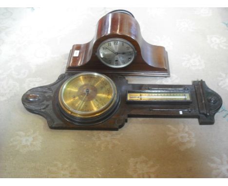 A mahogany cased chiming mantle clock, together with an early 20th century oak barometer.