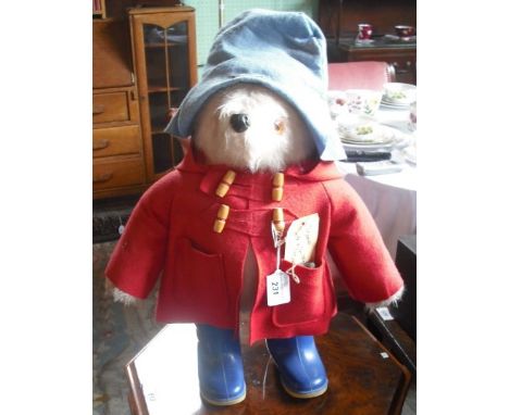 Paddington Bear, in blue hat, red duffel coat and blue Wellingtons, 52cm.