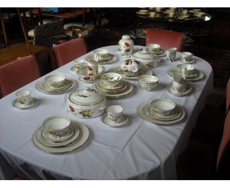 A Spode 'Country Lane' pattern dinner service, comprising: two vegetable tureens, tea cups and saucers, cereal bowls, dining 