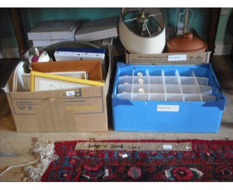 A large quantity of miscellaneous items contained in four boxes, to include: Royal Doulton collector's plates, an oak 1930's 