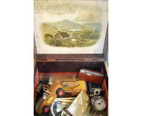 A 19th century bracket hinged mahogany box, containing a quantity of miscellania, to include: clock movements, cased penknive