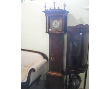 A late 18th/early 19th century longcase clock, the thirty hour brass dial marked Jonathon Marr, Retford, having Roman numeral