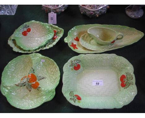 A quantity of mid-20th century leaf and tomato ceramics, to include: Beswick, Carltonware and Crown Devon.