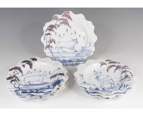 A set of eight Deborah Sears Isis plates, 20th century, in the Delft manner, each dia.25cm, together with a pair of Quimper p