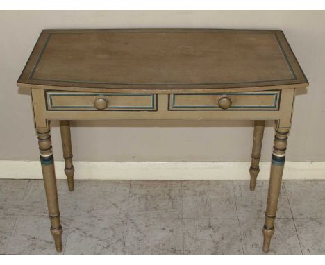 A Regency polychrome painted pine bowfront two drawer side table, raised on ring turned supports, h.73cm, w.91cm, d.49.5cmSta