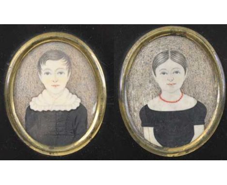 Mid-19th century English school - Pair; portrait studies of young siblings, him wearing a blue tunic and her with a coral nec