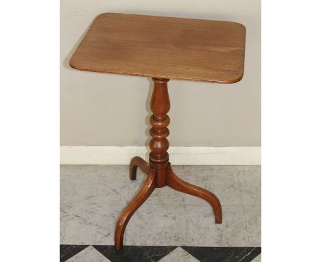 An early 19th century mahogany and fruitwood round cornered fixed top pedestal tripod occasional table, raised on umbrella su