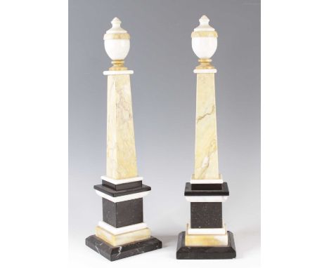 A pair of Victorian marble obelisk, each surmounted with a pedestal urn to a veined brecciated jasper flaring square column, 