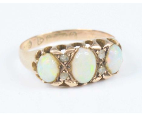 A 9ct rose gold, opal and diamond half hoop eternity ring, comprising three graduated oval opal cabochons interspersed with f