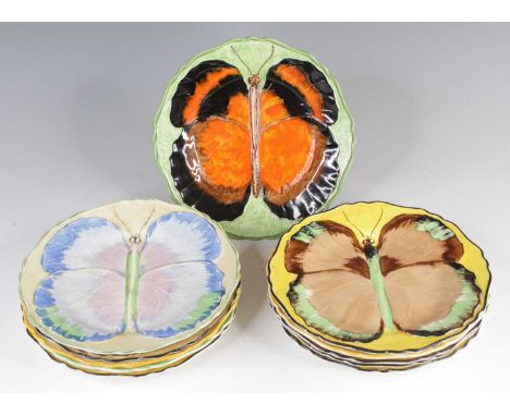 A collection of eleven Art Deco Hancock's ivoryware plates, each relief decorated with a butterfly, dia.22cmOne is cracked.Mo