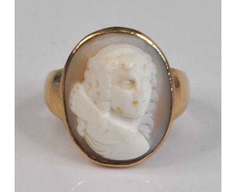 A 9ct yellow gold cameo ring, the oval shell cameo depicting a Georgian lady in a plain mount, size V, gross weight 7.4g, hal