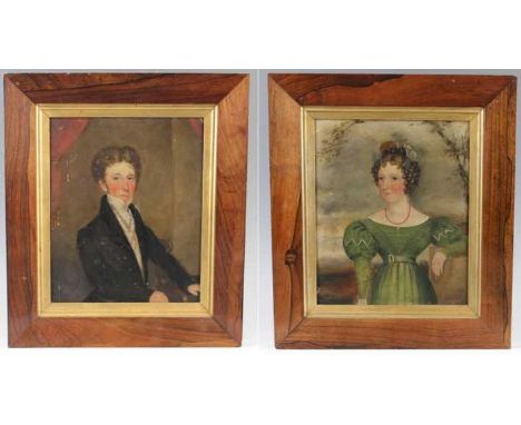 19th century English school - Pair of naive half-length portrait studies of a lady and gentleman, him wearing a black tunic a