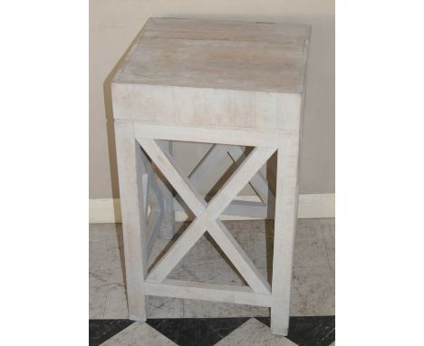 A contemporary limed wood square lamp table, raised on plain supports to X side profiles, h.74cm, w.45.5cm, d.45.5cm