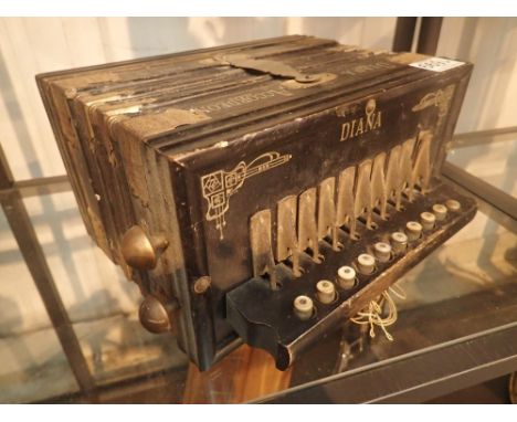 Vintage Diana accordion made in Germany with ebonised balck wood and brass fittings