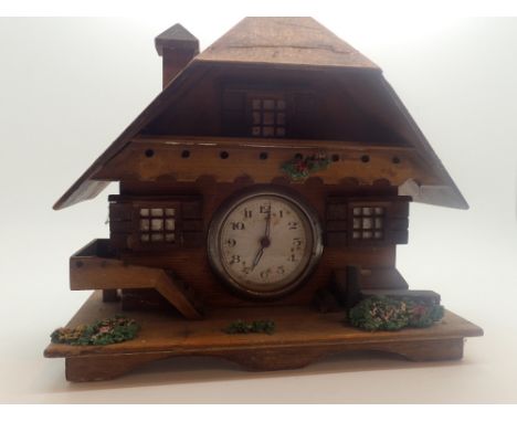 Swiss cottage jewellery box with central clock