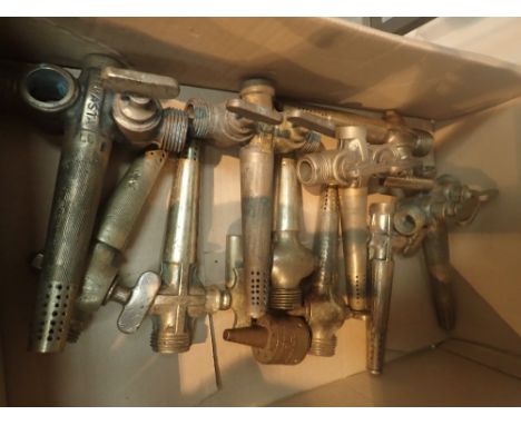 Six single and four double brass vintage beer taps