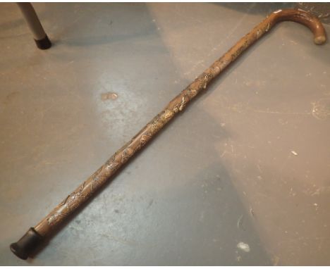 Wooden walking stick with badges including rare Led Zeppelin example