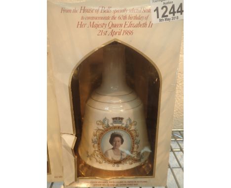 Bells commemorative ceramic bottle of whisky 1986 Queens 60th Birthday in box sealed with contents