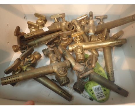 Eleven brass vintage beer taps